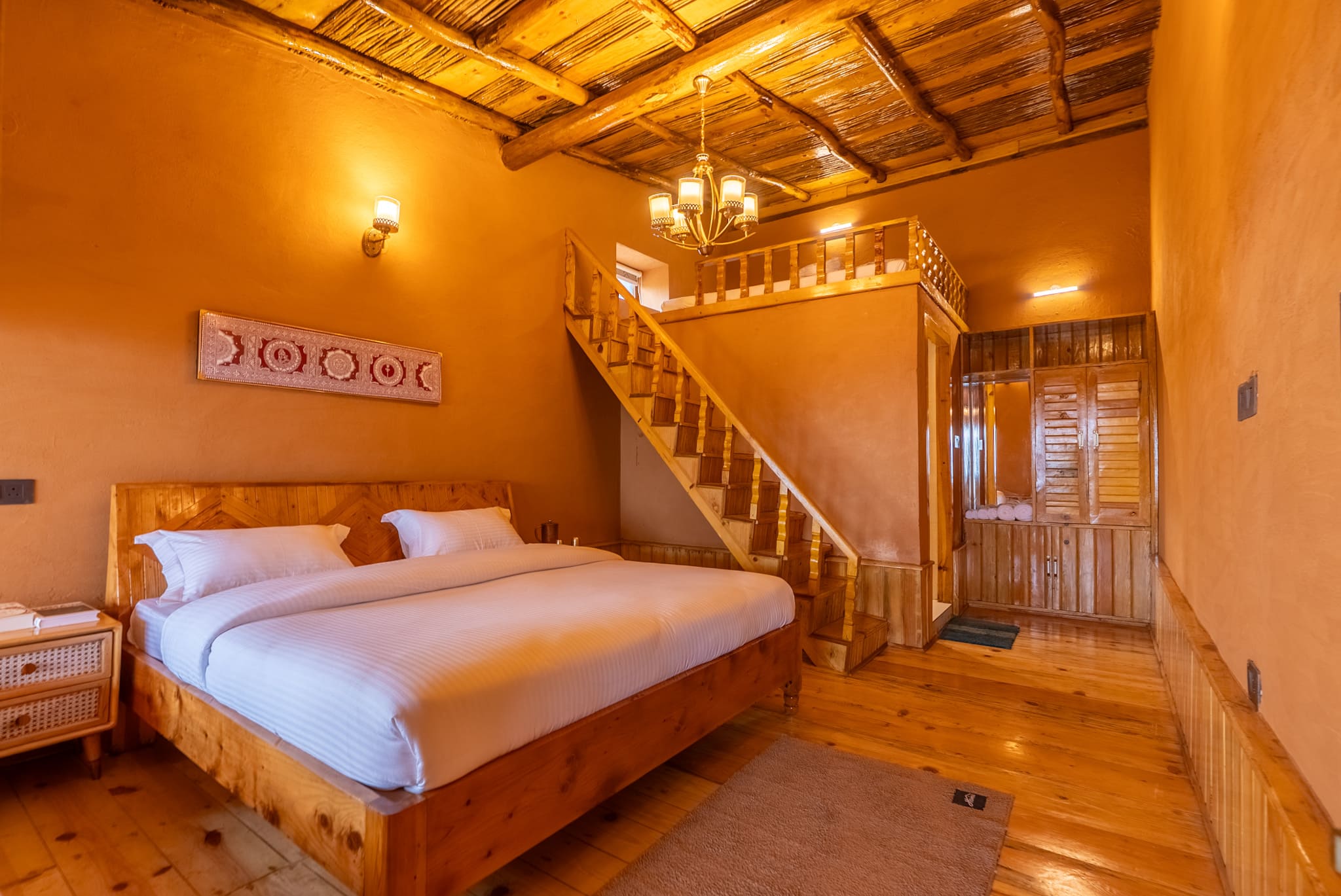 Kutir Suite — bedroom and machan